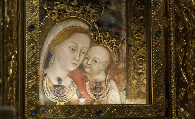 The image of Our Mother of Good Counsel is displayed in the Basilica of the Sanctuary in Genazzano, Italy, Thursday, May 15, 2025. (AP Photo/Gregorio Borgia)