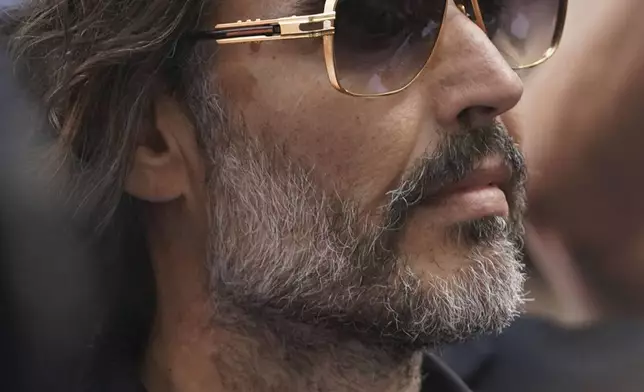 Russell Brand arrives at Westminster Magistrates' court in London, Friday, May 2, 2025, where he faces, rape and sexual assault charges involving four women. (AP Photo/Alberto Pezzali)