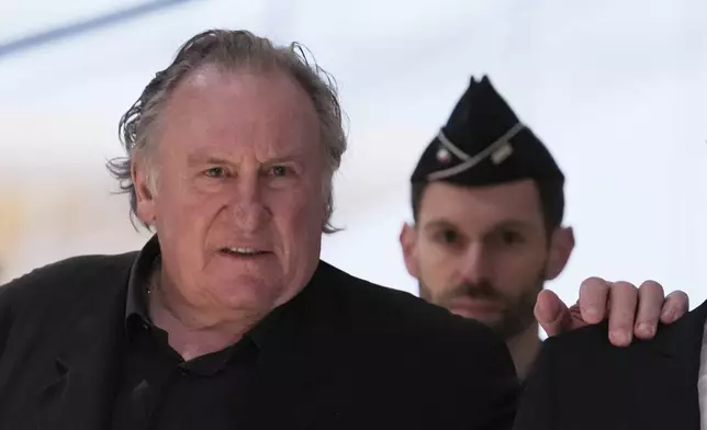 FILE - Actor Gerard Depardieu arrives to face trial for the alleged sexual assaults of two women on a film set in 2021, on March 24, 2025 in Paris. (AP Photo/Aurelien Morissard, File)