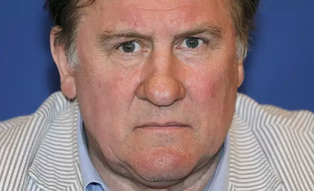 FILE - French actor, film-maker, businessman and vineyard owner, Gerard Depardieu, attends a press conference for the presentation of the first Russian Film Festival in Nice, southern France, on June 6, 2013. (AP Photo/Lionel Cironneau, File)