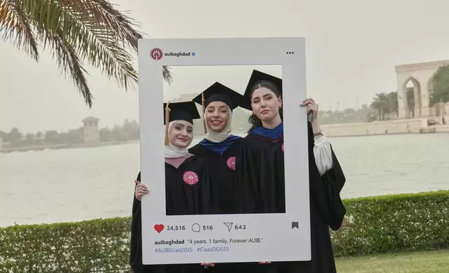 The American University of Iraq - Baghdad graduates take photos during the first graduation for the school in Baghdad, Iraq, Saturday, May 24, 2025. (AP Photo/Hadi Mizban)