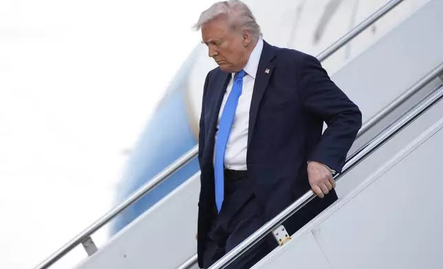 President Donald Trump arrives at Tuscaloosa National Airport, Thursday, May 1, 2025, in Tuscaloosa, Ala. (AP Photo/Manuel Balce Ceneta)
