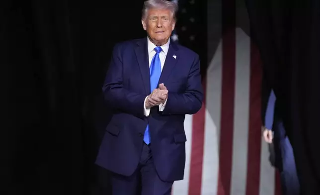 President Donald Trump arrives to give a commencement address at the University of Alabama, Thursday, May 1, 2025, in Tuscaloosa, Ala. (AP Photo/Manuel Balce Ceneta)