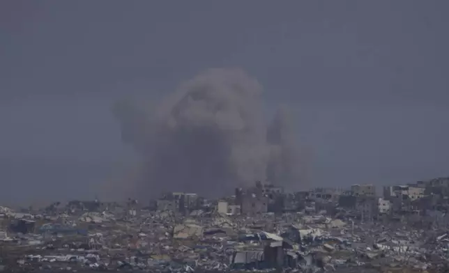 Smoke rises to the sky in the Gaza Strip as seen from southern Israel, Tuesday, May 6, 2025. (AP Photo/Ohad Zwigenberg)