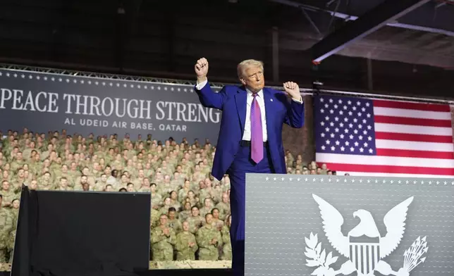 President Donald Trump gestures after speaking at the Al Udeid Air Base, Thursday, May 15, 2025, in Doha, Qatar. (AP Photo/Alex Brandon)