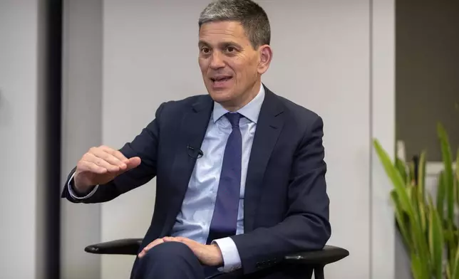 David Miliband, president and CEO of the International Rescue Committee, speaks during an interview with the Associated Press, Thursday, May 8, 2025, in Washington. (AP Photo/Mark Schiefelbein)