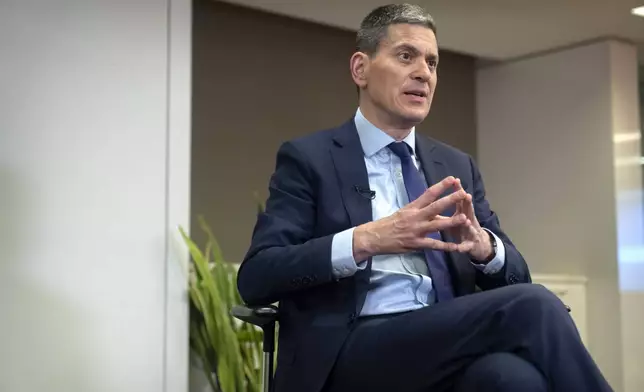 David Miliband, president and CEO of the International Rescue Committee, speaks during an interview with the Associated Press, Thursday, May 8, 2025, in Washington. (AP Photo/Mark Schiefelbein)