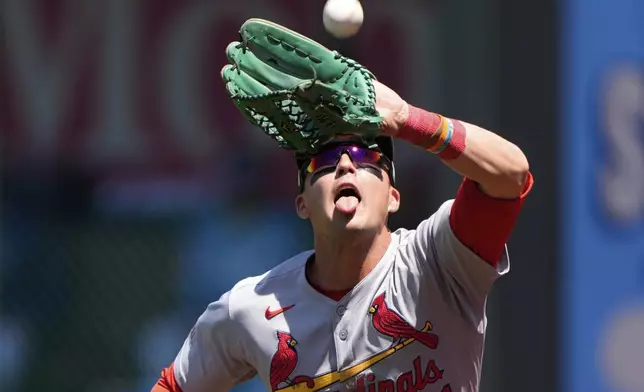 St. Louis Cardinals right fielder Lars Nootbaar catches a fly foul ball for the out on Kansas City Royals' Bobby Witt Jr. during the third inning of a baseball game Sunday, May 18, 2025, in Kansas City, Mo. (AP Photo/Charlie Riedel)