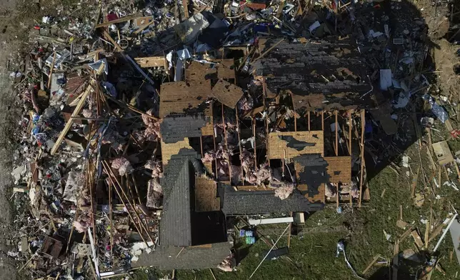 A destroyed home is seen from above, Sunday, May 18, 2025, in London, Ky., after a severe storm passed through the area. (AP Photo/Carolyn Kaster)