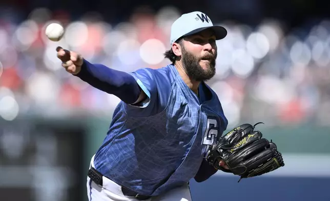 Washington Nationals starting pitcher Trevor Williams throws during the first inning of a baseball game against the St. Louis Cardinals, Saturday, May 10, 2025, in Washington. (AP Photo/Nick Wass)