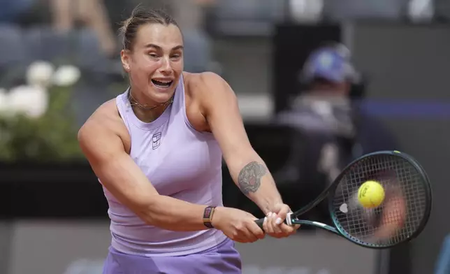 Russia's Aryna Sabalenka returns a shot against Sofia Kenin of the U.S, during a fourth round tennis match at the Italian Open tennis tournament, in Rome, Sunday, May 11, 2025. (Alfredo Falcone/LaPresse via AP)