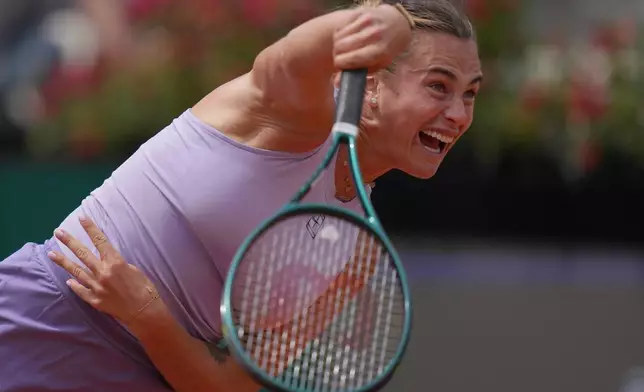 Russia's Aryna Sabalenka returns a shot against Sofia Kenin of the U.S, during a fourth round tennis match at the Italian Open tennis tournament, in Rome, Sunday, May 11, 2025. (Alfredo Falcone/LaPresse via AP)