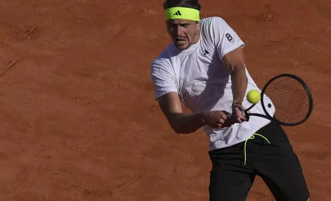 Germany's Alexander Zverev returns the ball to Lithuania's Vilius Gaubas at the Italian Open tennis tournament, in Rome, Italy, Sunday, May 11, 2025 (Alfredo Falcone/LaPresse via AP)