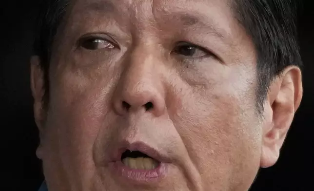 FILE -Philippine President Ferdinand Marcos Jr. speaks during the 89th anniversary of the Armed Forces of the Philippines at the military headquarters Camp Aguinaldo in Quezon City, Philippines on Dec. 20, 2024. (AP Photo/Aaron Favila, File)