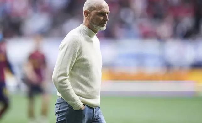 Vancouver Whitecaps head coach Jesper Sorensen walks off the field during halftime of an MLS soccer match against Real Salt Lake, in Vancouver, on Saturday, May 3, 2025. (Darryl Dyck/The Canadian Press via AP)