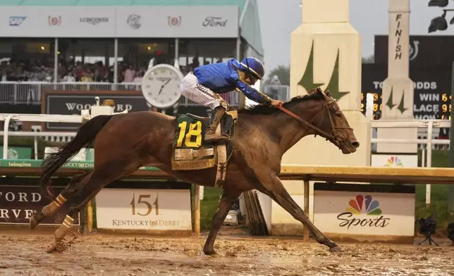 Sovereignty, ridden by Junior Alvarado, crosses the finish line to win the 151st running of the Kentucky Derby horse race at Churchill Downs Saturday, May 3, 2025, in Louisville, Ky. (AP Photo/Jeff Roberson)