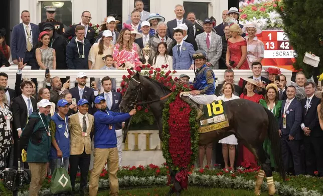 Jockey Junior Alvarado celebrates after riding Sovereignty to victory in the 151st running of the Kentucky Derby horse race at Churchill Downs Saturday, May 3, 2025, in Louisville, Ky. (AP Photo/Abbie Parr)
