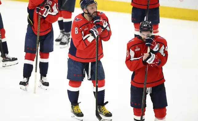 Washington Capitals left wing Alex Ovechkin (8) looks on after Game 5 of a second-round NHL hockey playoff series against the Carolina Hurricanes Thursday, May 15, 2025, in Washington. (AP Photo/Nick Wass)