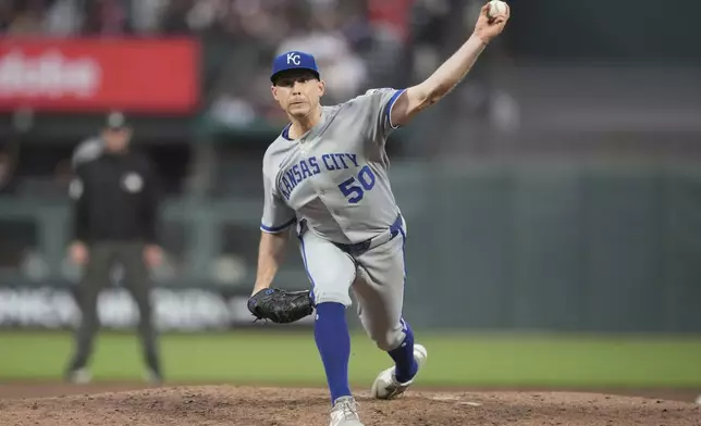 Kansas City Royals pitcher Kris Bubic (50) throws against the San Francisco Giants during the sixth inning of a baseball game in San Francisco, Monday, May 19, 2025. (AP Photo/Jeff Chiu)