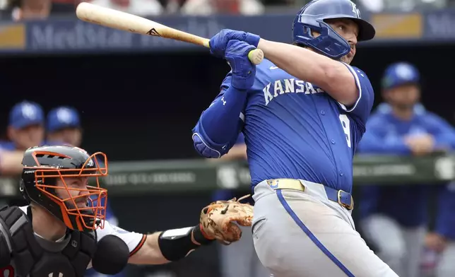 Kansas City Royals' Vinnie Pasquantino hits a home run during the seventh inning of a baseball game against the Baltimore Orioles, Sunday, May 4, 2025, in Baltimore. (AP Photo/Daniel Kucin Jr.)