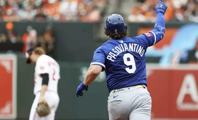 Kansas City Royals' Vinnie Pasquantino (9) celebrates after hitting a home run during the seventh inning of a baseball game against the Baltimore Orioles, Sunday, May 4, 2025, in Baltimore. (AP Photo/Daniel Kucin Jr.)