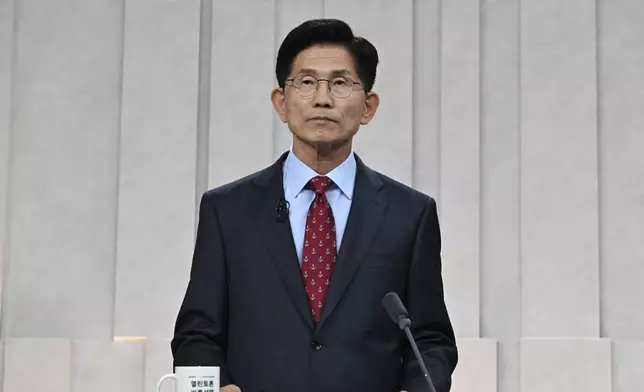 FILE - South Korea's presidential candidate Kim Moon Soo of the People Power Party poses for photograph ahead of a 3rd televised presidential debate for the forthcoming June 3 presidential election at MBC studio on May 27, 2025 in Seoul, South Korea. (Kim Min-Hee/Kyodo, Pool via AP, File)