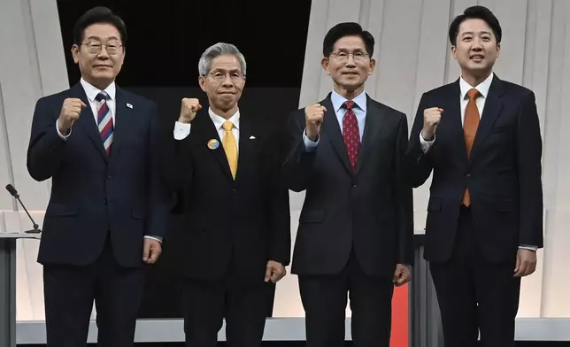 FILE - From left: South Korea's presidential candidates, Lee Jae-myung of the Democratic Party, Kwon Young-guk of the Democratic Labor Party, Kim Moon Soo of the People Power Party and Lee Jun-seok of the New Reform Party pose for photograph ahead of a 3rd televised presidential debate for the forthcoming June 3 presidential election at MBC studio on May 27, 2025 in Seoul, South Korea. (Kim Min-Hee/Kyodo, Pool via AP, File)