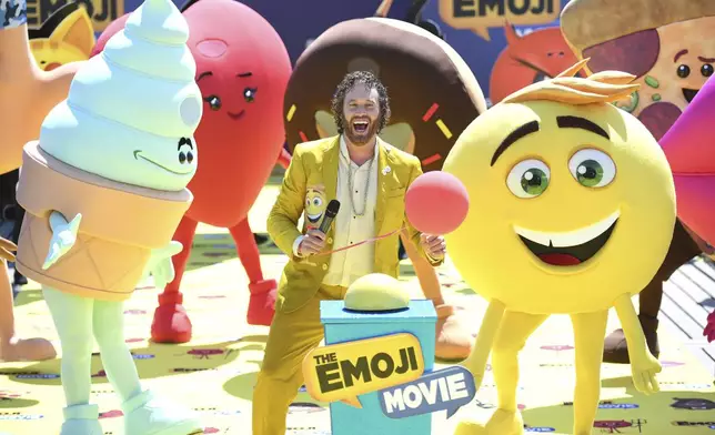 FILE - Actor T. J. Miller poses with characters during the photo call for the film The Emoji Movie, at the 70th international film festival, Cannes, southern France, Tuesday, May 16, 2017. (Photo by Arthur Mola/Invision/AP, File)