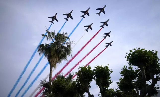 FILE - French Alpha Jets Patrouille de France fly over the premiere of the film 'Top Gun: Maverick' at the 75th international film festival, Cannes, southern France, Wednesday, May 18, 2022, File. (AP Photo/Daniel Cole)