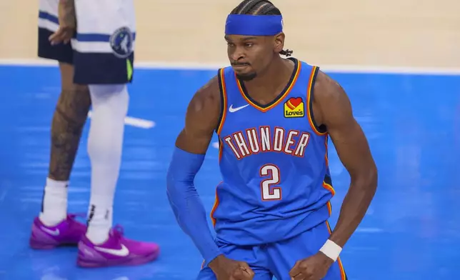 Oklahoma City Thunder guard Shai Gilgeous-Alexander reacts after a play against the Minnesota Timberwolves during the first half of Game 2 of an NBA basketball Western Conference Finals playoff series Thursday, May 22, 2025, in Oklahoma City. (AP Photo/Nate Billings)