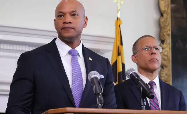 Maryland Gov. Wes Moore speaks at a news conference on Thursday, May 15, 2025 in Annapolis, Md., Maryland Attorney General Anthony Brown is standing right. (AP Photo/Brian Witte)