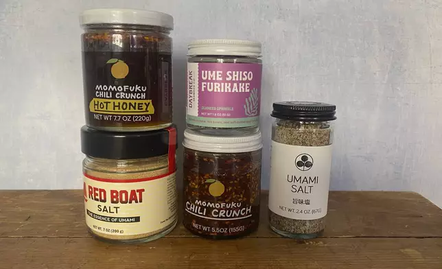 This April 2025 image provided by Katie Workman shows an array of umami-rich condiments. (Katie Workman via AP)
