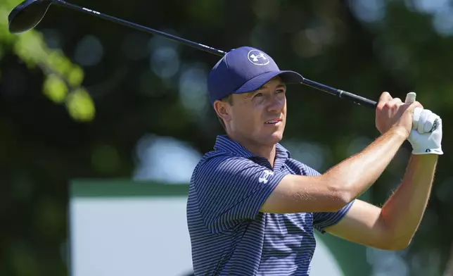 Jordan Spieth watches his tee shot on the second hole during the final round of the CJ Cup Byron Nelson golf tournament in McKinney, Texas, Sunday, May 4, 2025. (AP Photo/LM Otero)