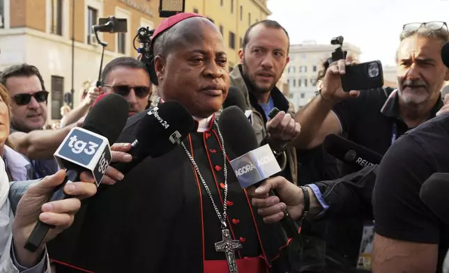 Cardinal Fridolin Ambongo Besungu arrives at the Vatican, Saturday, May 3, 2025, to attend the General Congregation of cardinals in the New Synod Hall where they are preparing for the upcoming conclave starting on May 7, to elect the 267th Roman pontiff. (AP Photo/Andrew Medichini)