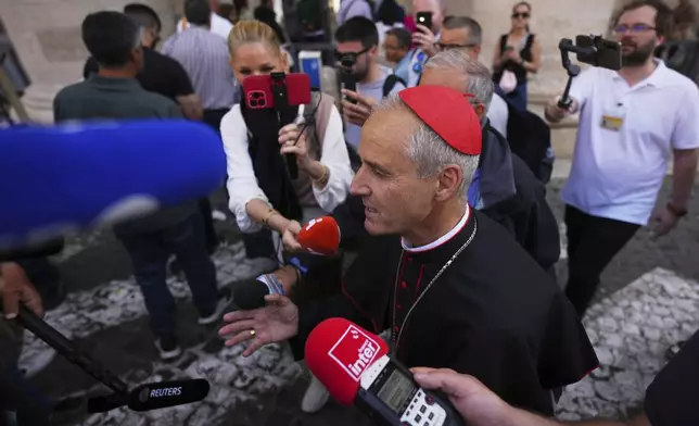 Cardinal Cardinal Jean-Paul Vesco arrives at the Vatican, Saturday, May 3, 2025, to attend the General Congregation of cardinals in the New Synod Hall where they are preparing for the upcoming conclave starting on May 7, to elect the 267th Roman pontiff. (AP Photo/Andrew Medichini)