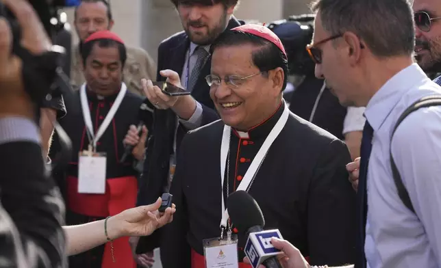 Cardinal Charles Maung Bo arrives at the Vatican, Saturday, May 3, 2025, to attend the General Congregation of cardinals in the New Synod Hall where they are preparing for the upcoming conclave starting on May 7, to elect the 267th Roman pontiff. (AP Photo/Andrew Medichini)