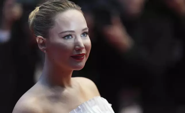 Jennifer Lawrence poses for photographers upon arrival at the premiere of the film 'Die, My Love' at the 78th international film festival, Cannes, southern France, Saturday, May 17, 2025. (Photo by Lewis Joly/Invision/AP)