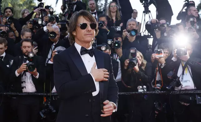 Tom Cruise poses for photographers upon arrival at the premiere of the film 'Mission: Impossible - The Final Reckoning' at the 78th international film festival, Cannes, southern France, Wednesday, May 14, 2025. (Photo by Joel C Ryan/Invision/AP)