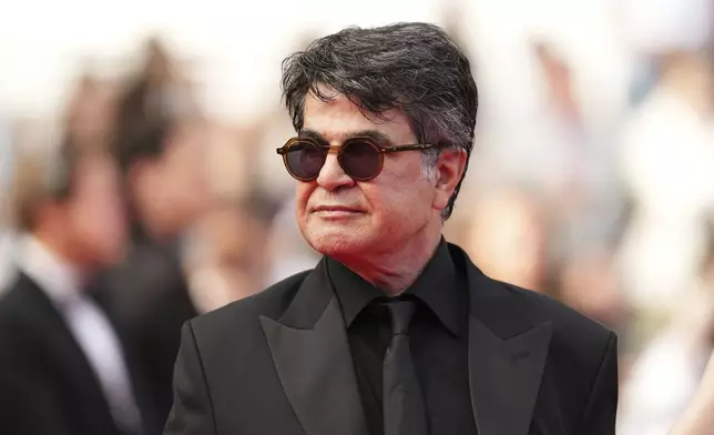 Jafar Panahi poses for photographers during the awards ceremony red carpet at the 78th international film festival, Cannes, southern France, Saturday, May 24, 2025. (Photo by Scott A Garfitt/Invision/AP)