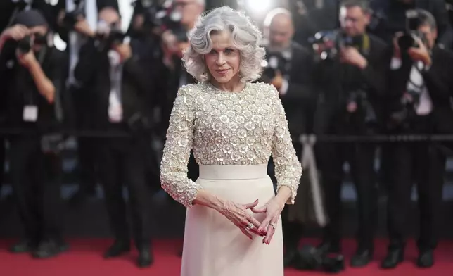 Jane Fonda poses for photographers during the awards ceremony red carpet at the 78th international film festival, Cannes, southern France, Saturday, May 24, 2025. (AP Photo/Natacha Pisarenko)