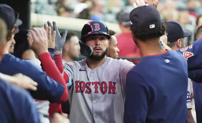 Boston Red Sox's Wilyer Abreu celebrates his home run against the Detroit Tigersin the sixth inning during a baseball game, Monday, May 12, 2025, in Detroit. (AP Photo/Paul Sancya)