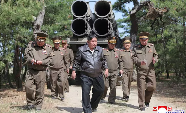 In this photo provided by the North Korean government, North Korean leader Kim Jong Un, center, supervises a drill of long-range artillery and missile systems at North Korea’s eastern coast Thursday, May 8, 2025. Independent journalists were not given access to cover the event depicted in this image distributed by the North Korean government. The content of this image is as provided and cannot be independently verified. Korean language watermark on image as provided by source reads: "KCNA" which is the abbreviation for Korean Central News Agency. (Korean Central News Agency/Korea News Service via AP)