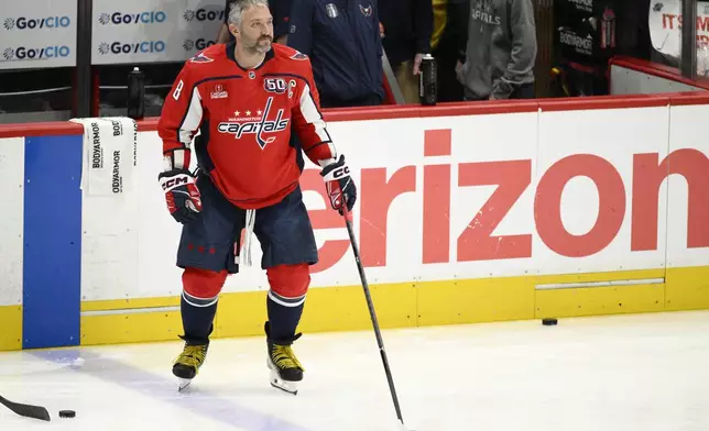 Washington Capitals left wing Alex Ovechkin (8) warms up before Game 5 of a first-round NHL hockey playoff series against the Montreal Canadiens Wednesday, April 30, 2025, in Washington. (AP Photo/Nick Wass)