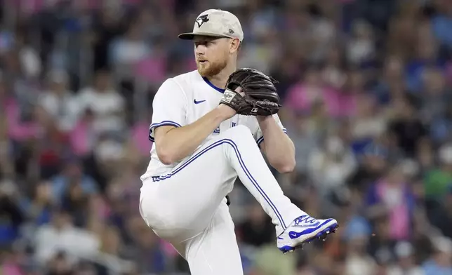 Toronto Blue Jays pitcher Eric Lauer (56) works against the Detroit Tigers during the first inning of a baseball game in Toronto, Saturday, May 17, 2025. (Chris Young/The Canadian Press via AP)