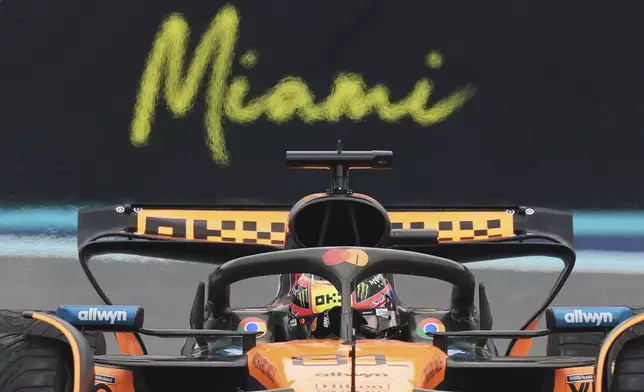 McLaren driver Oscar Piastri of Australia steers his car during the Sprint race at the Formula One Miami Grand Prix auto race, Saturday, May 3, 2025, in Miami Gardens, Fla. (AP Photo/Rebecca Blackwell)