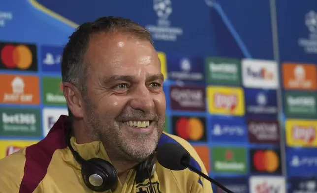 Barcelona's head coach Hansi Flick attends a press conference at the San Siro stadium in Milan, Italy, Monday, May 5, 2025, ahead of the Champions League semifinals second leg soccer match between Inter Milan and Barcelona on Tuesday. (AP Photo/Antonio Calanni)