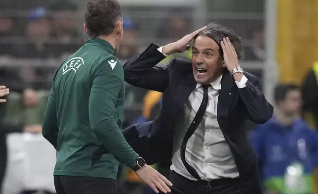 Inter Milan's head coach Simone Inzaghi shouts at UEFA official during the Champions League semifinal second leg soccer match between Inter Milan and Barcelona at San Siro stadium in Milan , Italy, Tuesday, May 6, 2025. (AP Photo/Antonio Calanni)