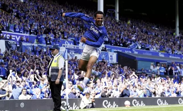 Everton's Iliman Ndiaye celebrates scoring during the English Premier League soccer match between Everton and Southampton at Goodison Park, Liverpool, England, Sunday May 18, 2025. (Martin Rickett/PA via AP)