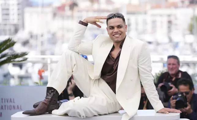 Ziad Zaza poses for photographers at the photo call for the film 'Aisha Can't Fly Away' at the 78th international film festival, Cannes, southern France, Wednesday, May 21, 2025. (Photo by Lewis Joly/Invision/AP)