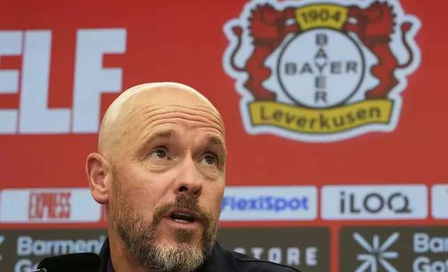 Erik ten Hag talks to the media during his presentation as new head coach of Bundesliga soccer club Bayer 04 Leverkusen at the BayArena stadium in Leverkusen, Germany, Monday, May 26, 2025. (AP Photo/Martin Meissner)
